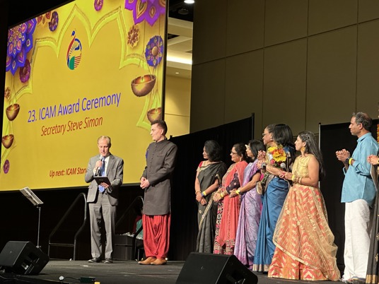 Sec. Simon awarding NASS Medallion to ICAM president Ajay Singh
