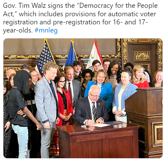 Gov. Tim Walz signing the "Democracy for the People Act"