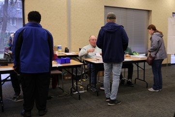 Election judges checking in voters